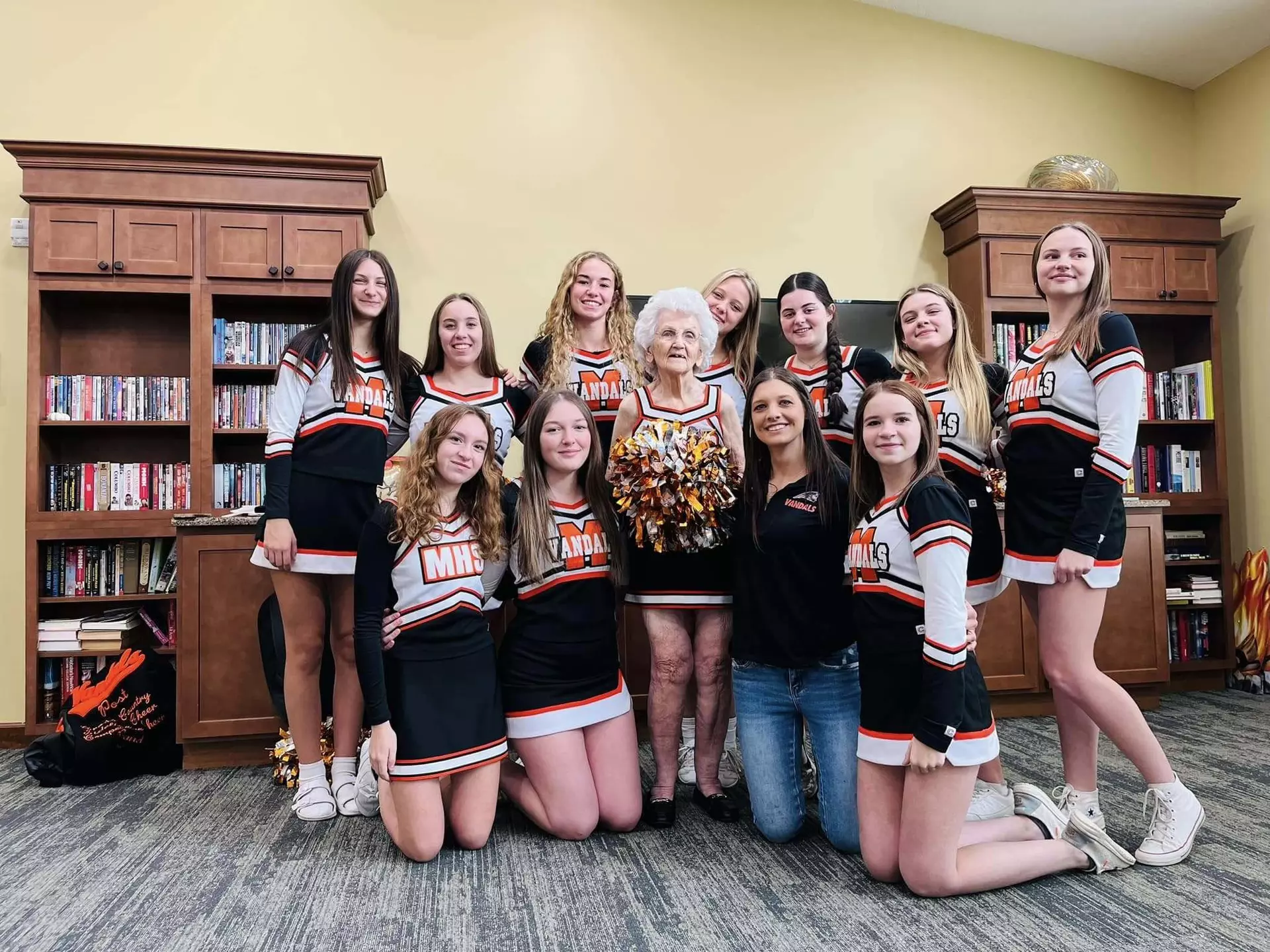 Candlestone Resident, 97, Joins High School Cheer Team She Helped Start